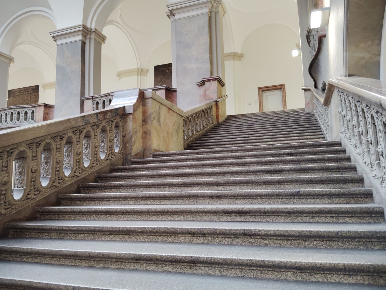 Granite stair treads in a grand marble stairway